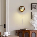 Art‑filled hallway gains gentle accent lighting from our vintage‑styled Voss Wall Lamp