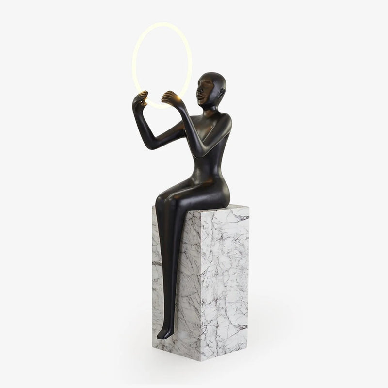 Bella Sculpture Floor Lamp featuring organic fluid curves and glass light sphere