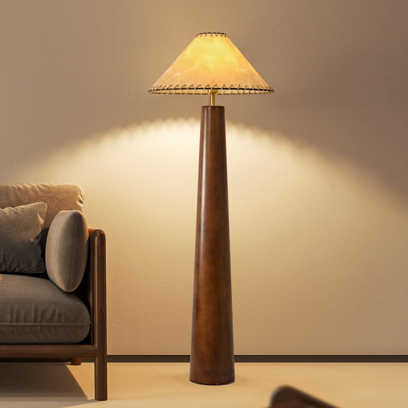 wooden column meets fabric shade, with a tapered design exuding simplicity and natural tranquility.