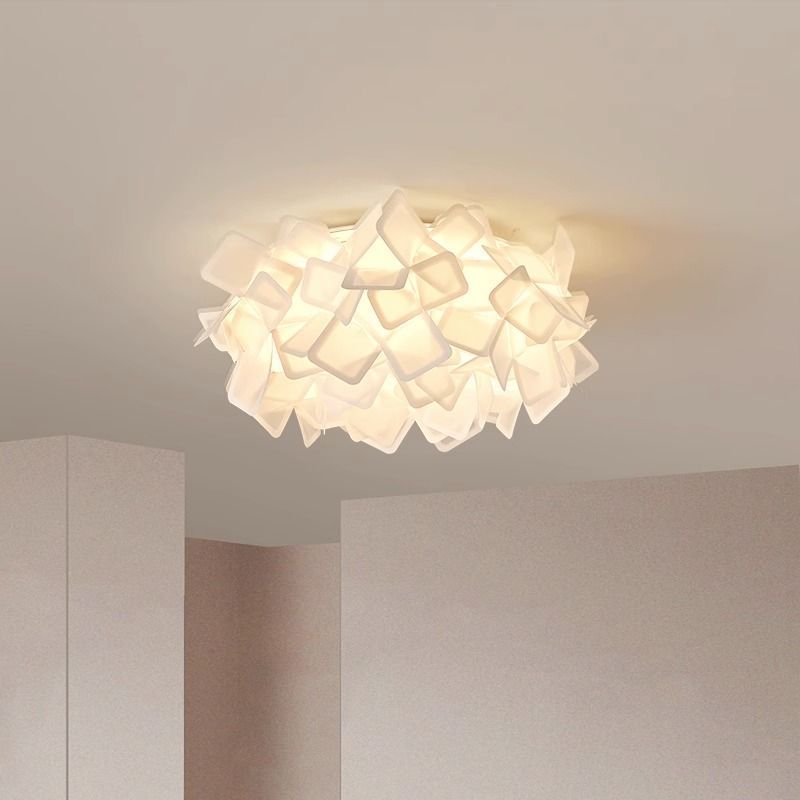 Clizia light in a dining room, complementing a contemporary interior.