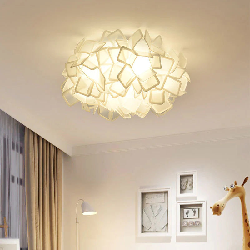 Clizia light in a reading nook, offering soft and comfortable lighting.