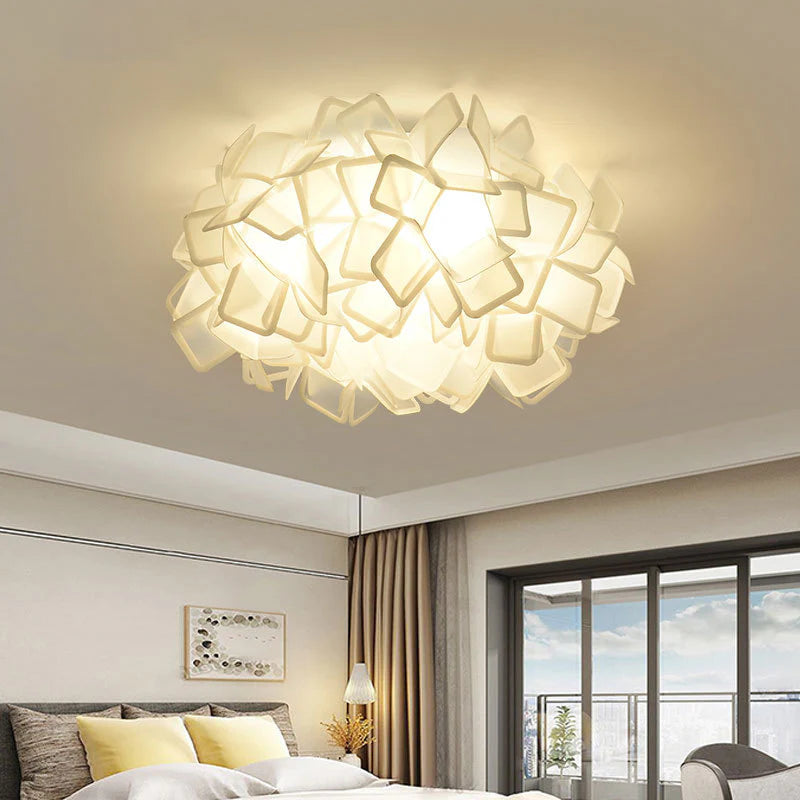 Clizia light installed in a high-ceiling space, highlighting its elegant lines and adaptability.