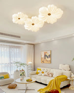 Three cream colored flower ceiling lamps in the fresh style living room