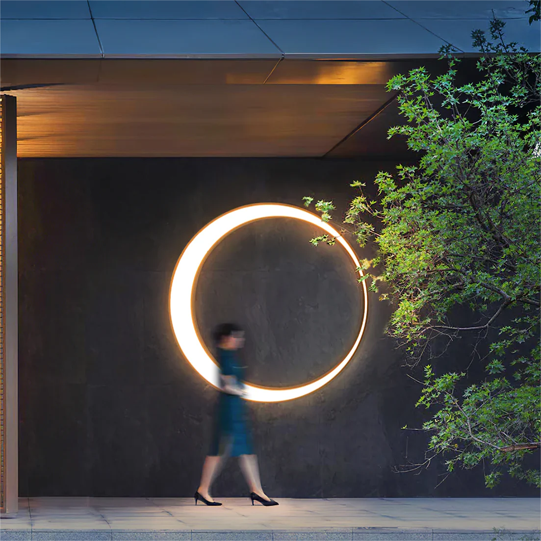 Energy - efficient Crescent Wall Light creating a warm lighting effect on wall