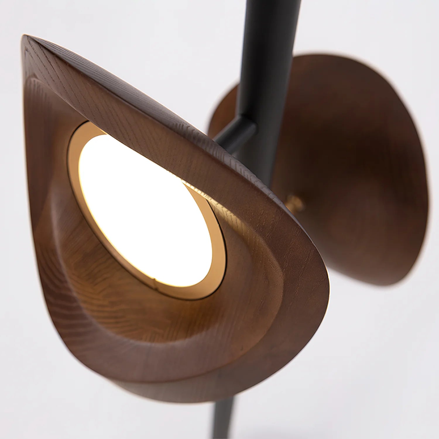 Close-up of the walnut shade of the double headed floor lamp