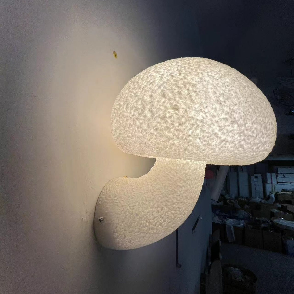 Mushroom Wall Sconce Illuminates a Corner of the Factory at Night