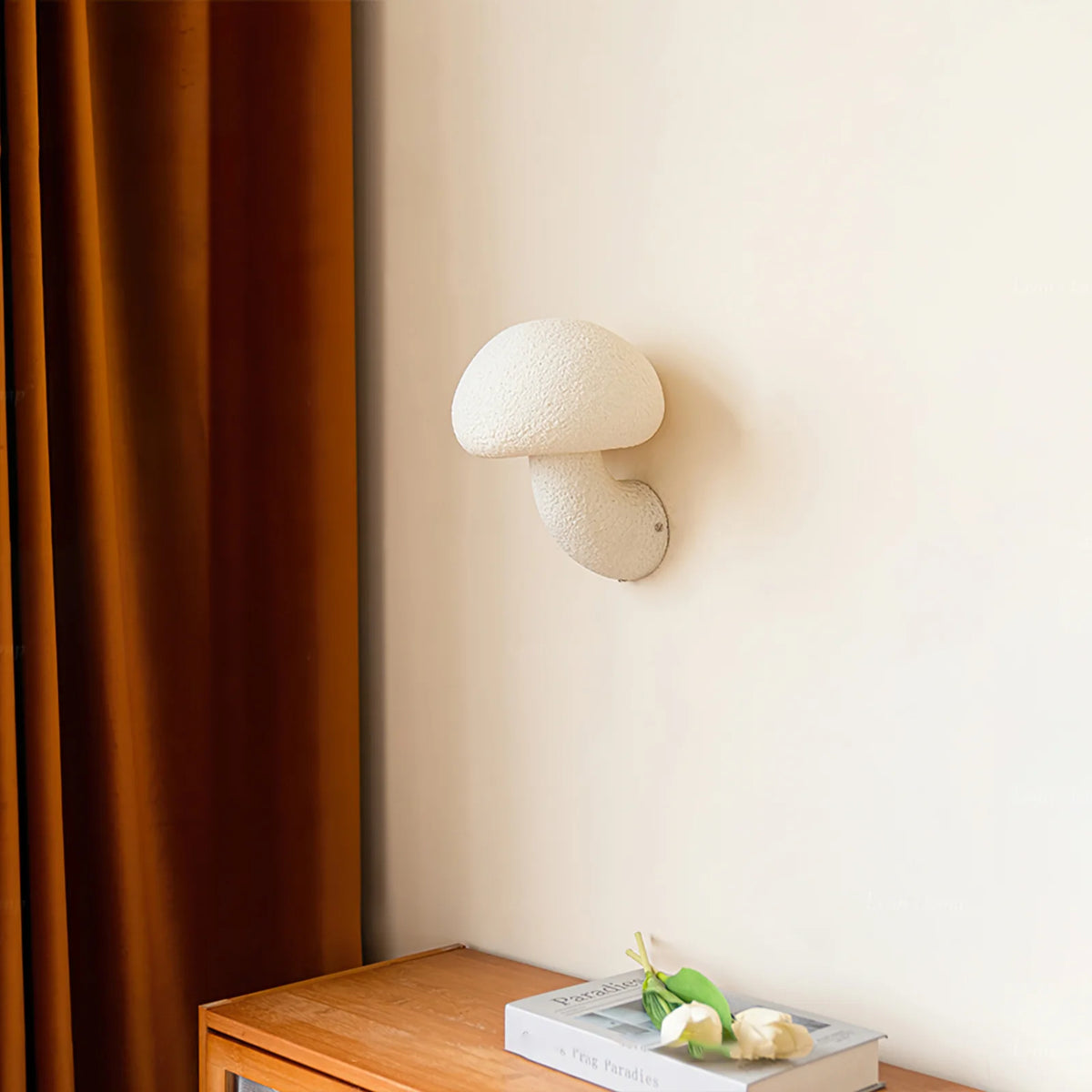 Mushroom sconce is like growing out of a wall