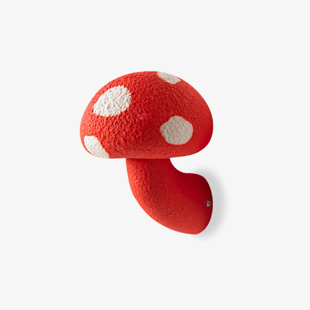 Display image of a red mushroom wall sconce with white spots