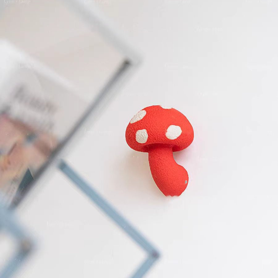 Close up image of mushroom wall lamp from a right up perspective