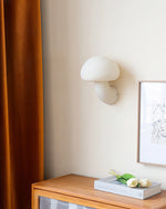 Resin wall sconces look very natural in modern living rooms