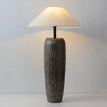 Floor lamp made of ceramic and fabric on a cool background
