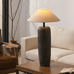 Black lamp post floor lamp next to the sofa in a Japanese-style room