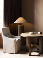 Wabi Sabi floor lamp glows alone in the corner