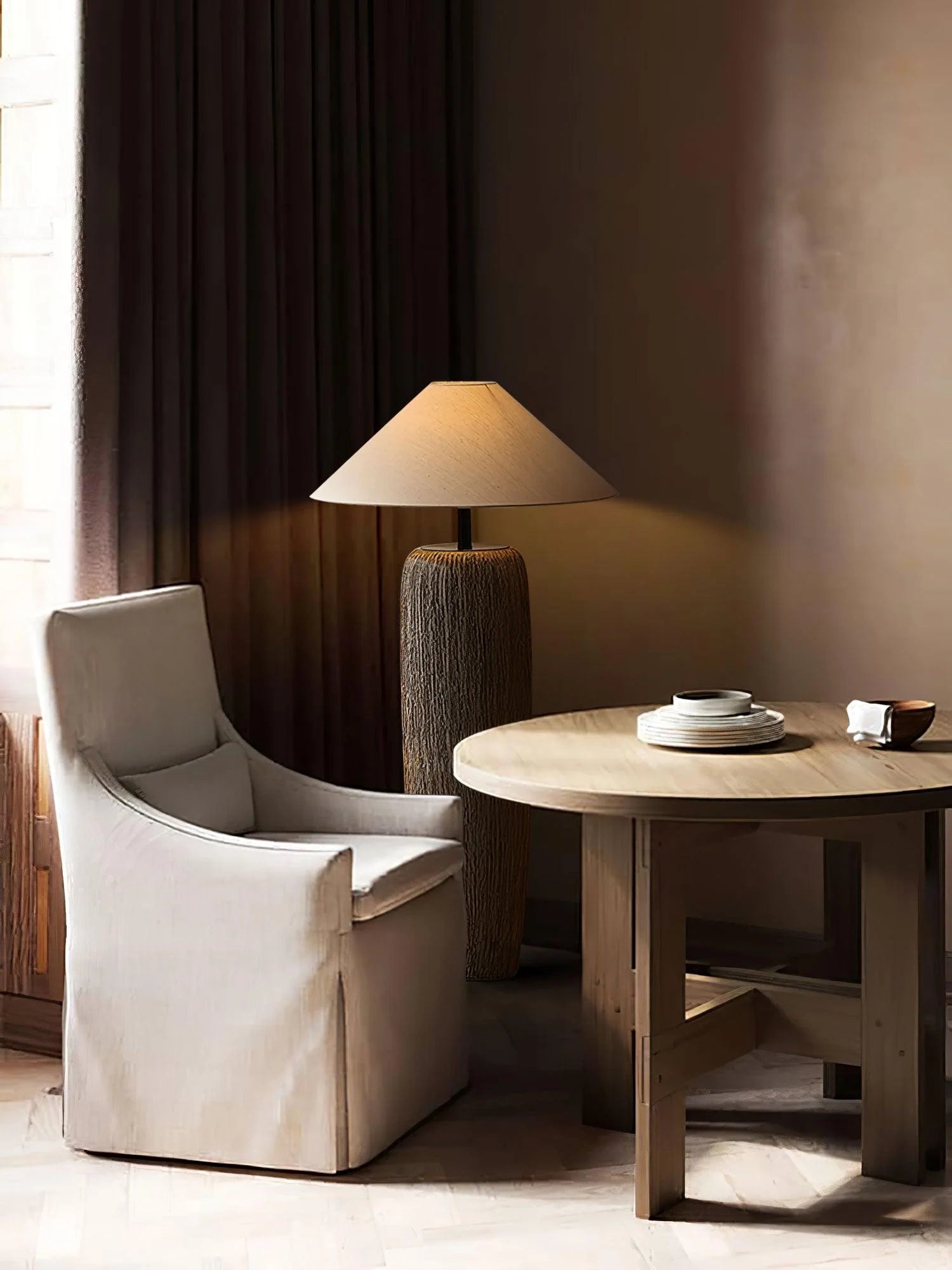 Wabi Sabi floor lamp glows alone in the corner