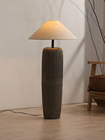 A harmonious image of the Wabi Sabi lamp and the furniture pieces next to it.