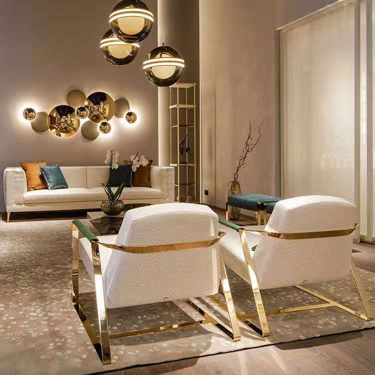 The golden round wall lamp illmunating a modern living room