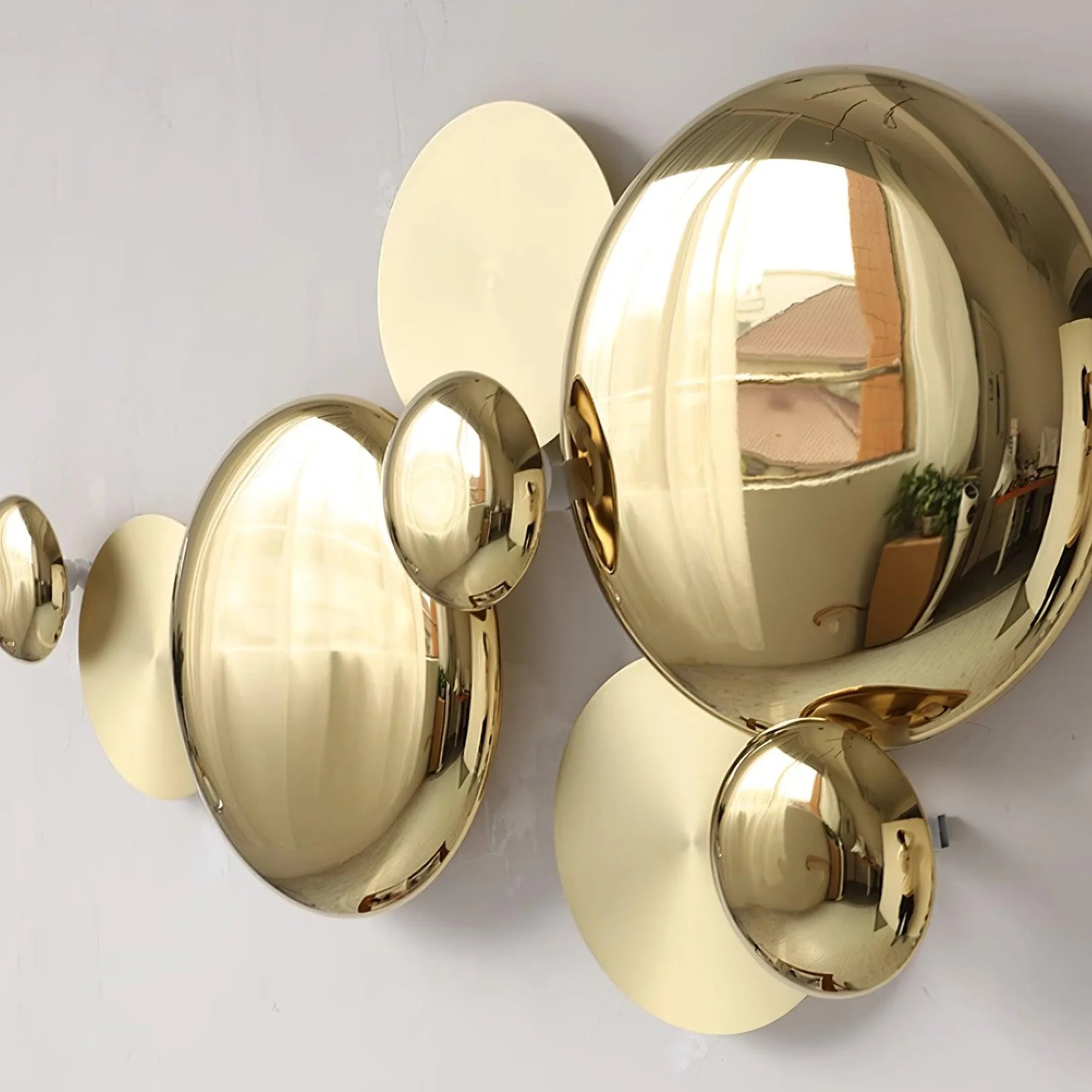 Close-up of the mirrored Forart Metal Wall Lamp