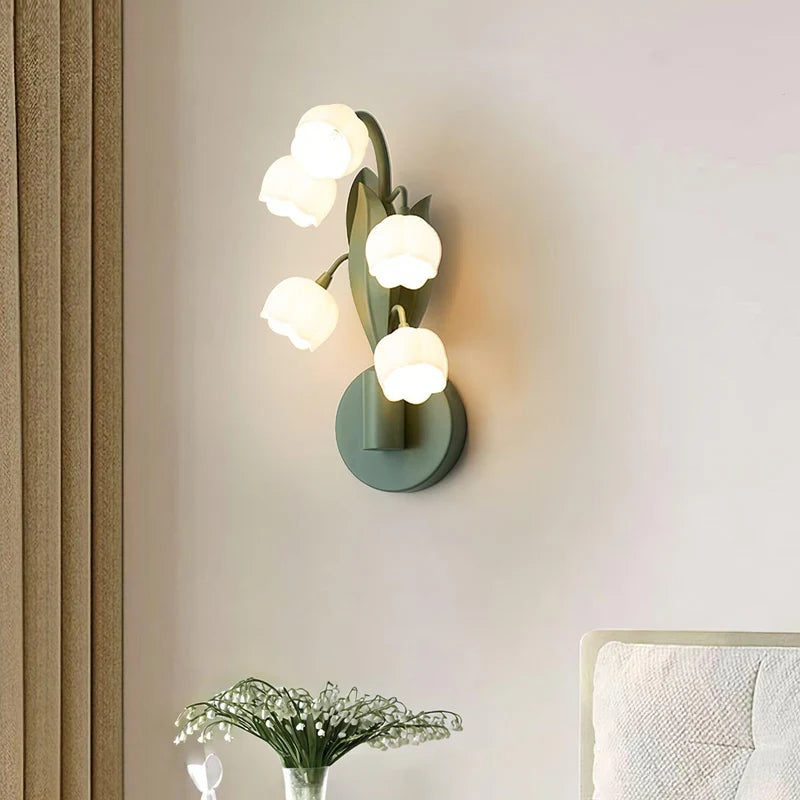 lily bud wall lamp next to the bed