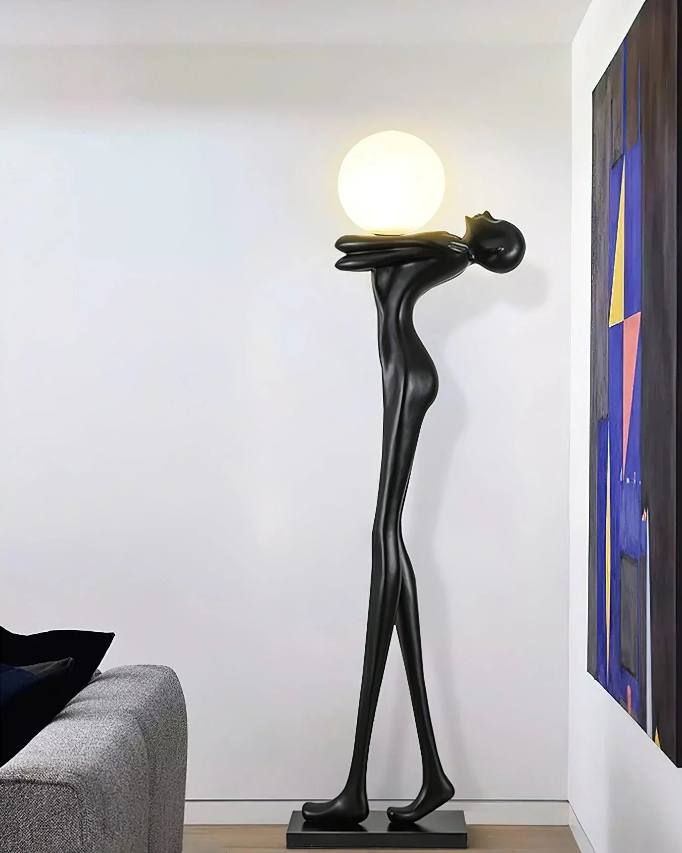 Stylish black humanoid abstract floor lamp for modern interiors