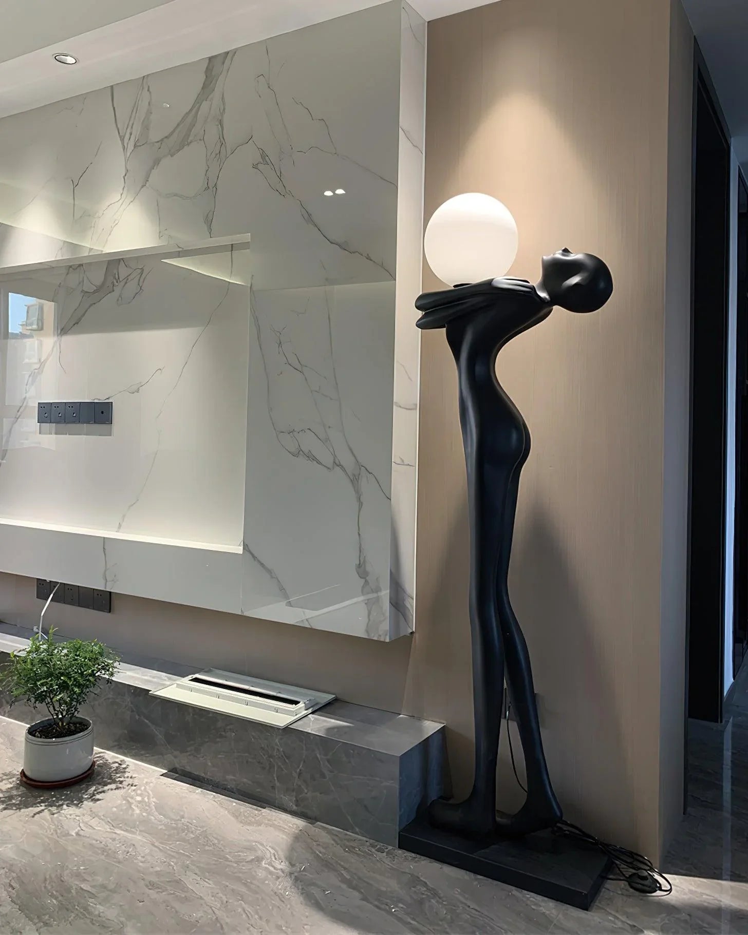 Elegant black humanoid abstract floor lamp for cozy corners