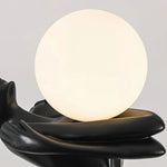 Statement - making humanoid abstract floor lamp with glowing orb