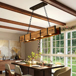 In_the_sunny_morning_the_vintage_wood_pendant_light_above_the_dining_table_also_shows_a_spring_feeling