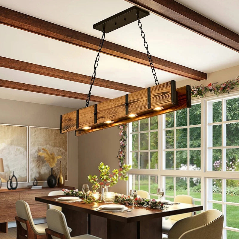 In_the_sunny_morning_the_vintage_wood_pendant_light_above_the_dining_table_also_shows_a_spring_feeling