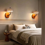 2 Travertine Hat Wall Lamps near the bed