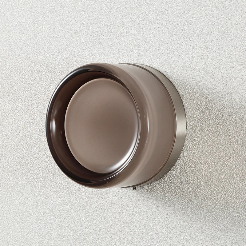 front view of smoky dimple wall light