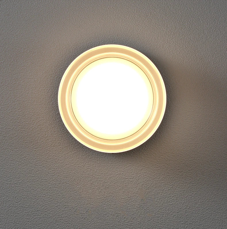 front view of white dimple wall sconce