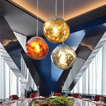 Three different colored lava chandeliers decorate the dining room