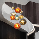 Different colored lava lamps light up the modern stairwell