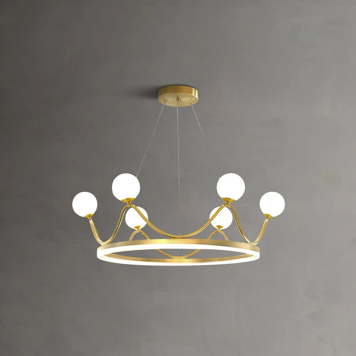 Luxury chandelier with a crown design, featuring white glass globes and a sleek metal frame.