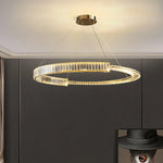 Warm ambient light from dimmable Toroidal Chandelier.