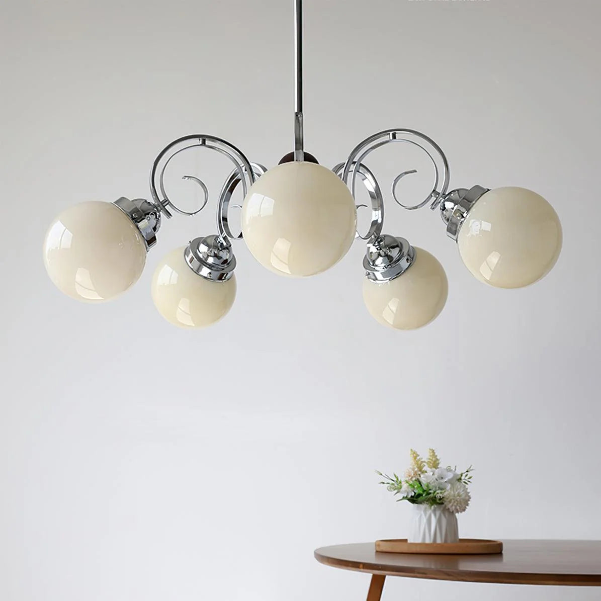 Marshmallow Chandelier next to a wood table