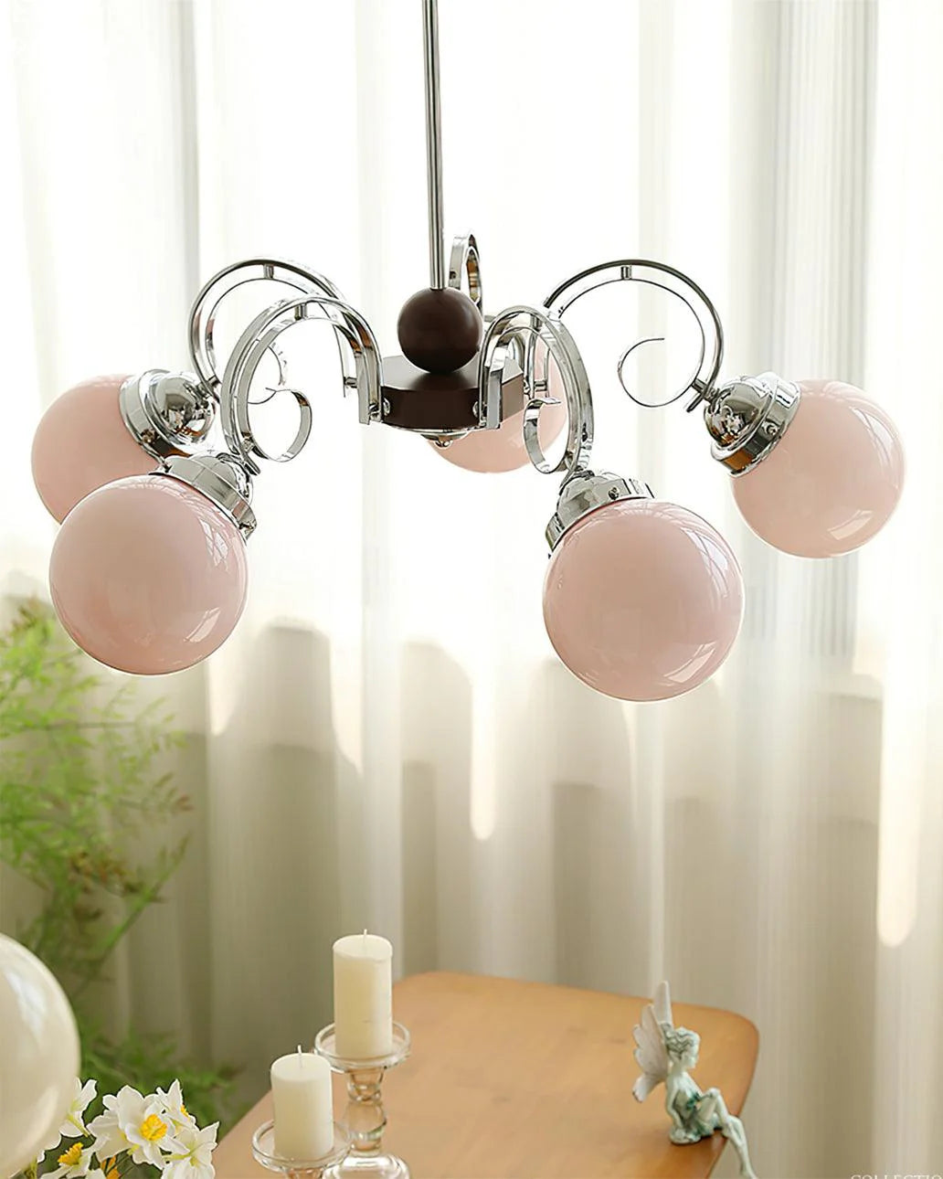 Marshmallow Chandelier with pink glass ball in a restaurant