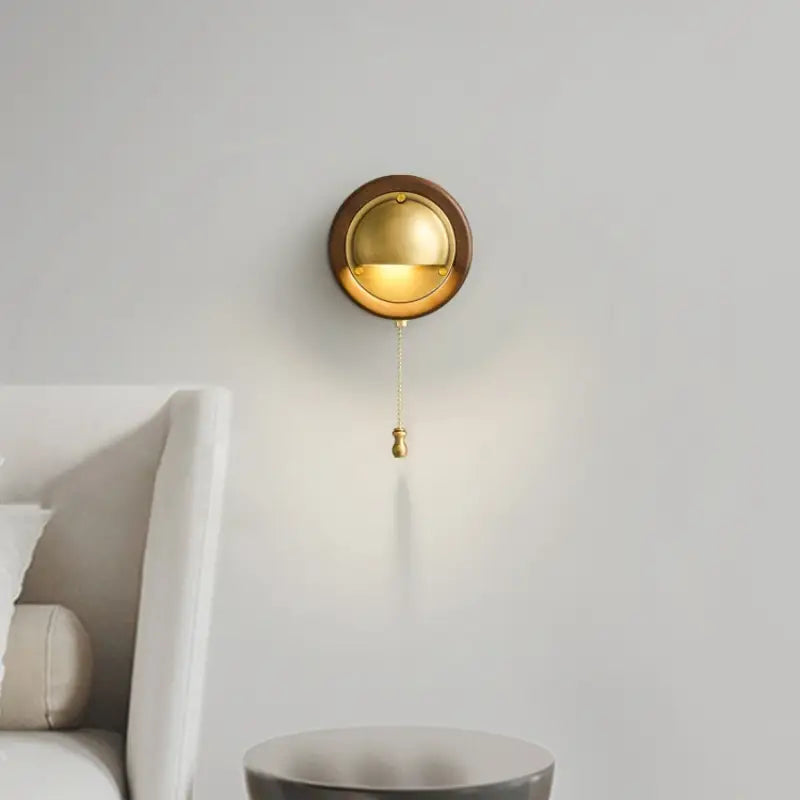Matte silver dome option updates the timeless design of Voss Wall Lamp