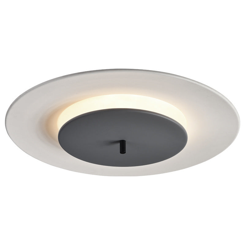 Black + white Minimalist Circular LED Ceiling Light Close-up.