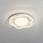 Contemporary ceiling lighting with smooth lines lights up the space beautifully.
