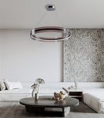 Modern Maytoni Chandelier with sleek acrylic shade in a minimalist dining room.