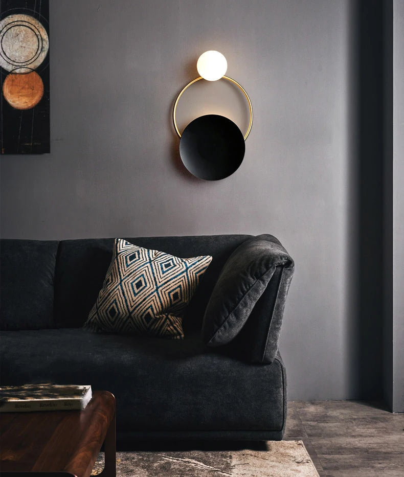 black metal with glass lamp shade near the sofa