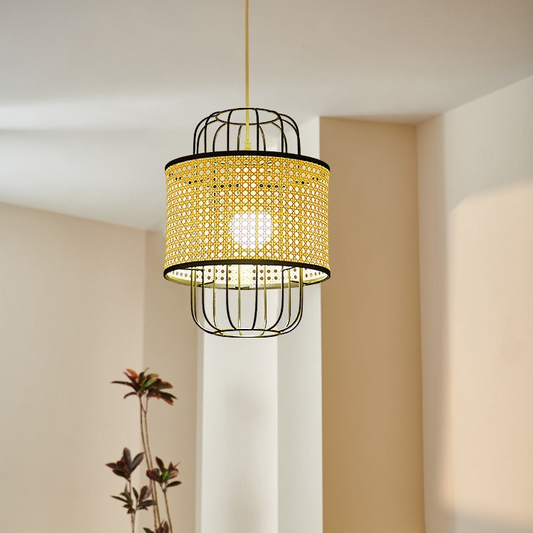 Bohemian-style rattan ceiling light illuminating a cozy living room with warm, dappled shadows.