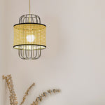 Eco-friendly rattan shade pendant lamp paired with minimalist decor in a Scandinavian bedroom.