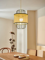 Natural rattan shade pendant lamp creating a tropical vibe in a sunlit patio setting.