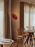 Drawing inspiration from vintage records, the Record Floor Lamp features a circular shade that adds a nostalgic yet modern touch to any room.