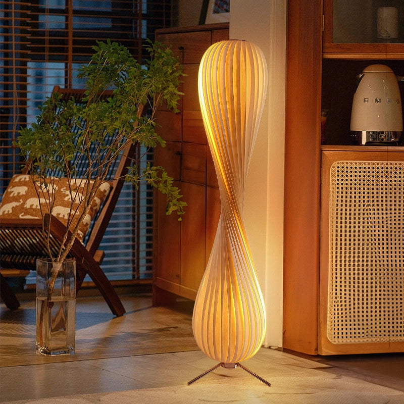 Rolled_Edge_Floor_Lamp_Unique_twisted_structure_with_stripes_emitting_gentle_illumination