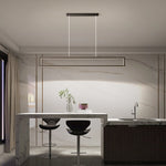 Sleek rectangular pendant light hanging over a marble kitchen island—features thin suspension wires, a modern frame, and warm ambient lighting that complements the marble backsplash, dark bar stools, and minimalist luxury kitchen decor.
