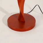Close-up of the wooden base of the Spiral Wooden Column Floor Lamp