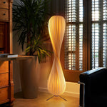 Striped_spiral_floor_lamp_an_artistic_piece_bringing_warm_lighting_to_interiors.