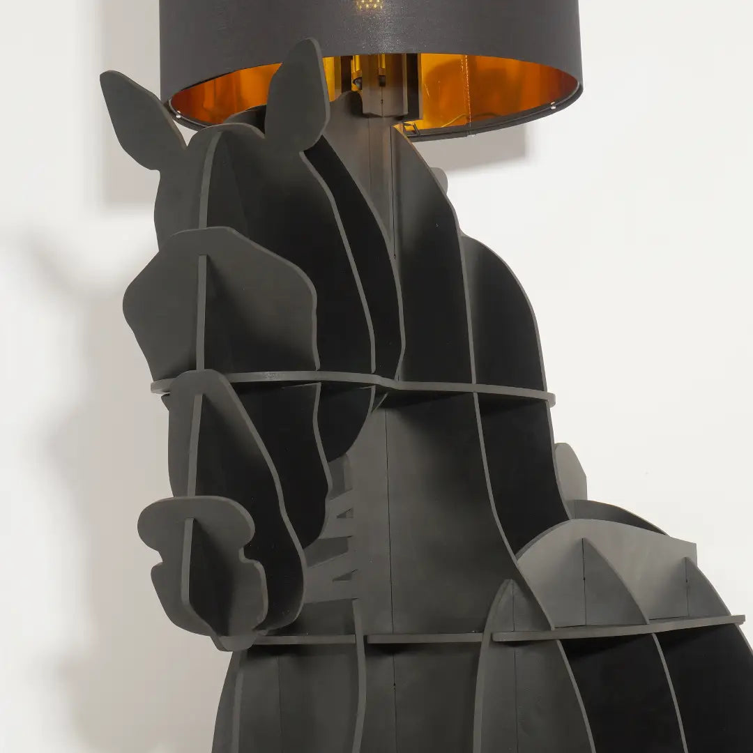 Close-up of Tete Horse Floor Lamp showing layered horse-shaped frame and matte black finish